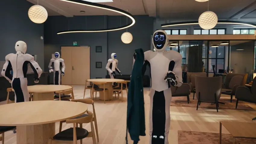 Компания 1X показа, как управляемые голосовыми командами роботы EVE убираются в офисе