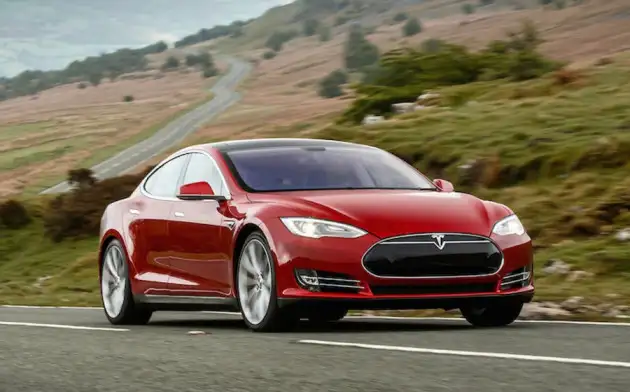 Автомобиль Tesla можно будет открыть при помощи чипа, вживленного в руку