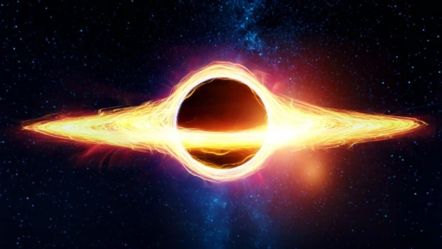 Гигантский космический объект поглощает чёрная дыра в галактике